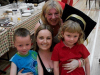 CLICK FOR LARGER IMAGE Liza with students